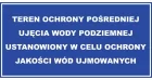 Tabliczka Teren ochrony pośredniej ujęcia wody podziemnej ustanowiony w celu ochrony jakości wód ujmowanych