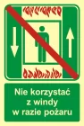 Zakaz korzystania z windy osobowej w razie pożaru - znak ewakuacyjny - AC035