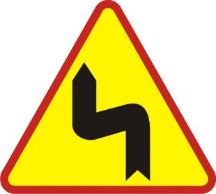 Znak A-4 Niebezpieczne zakręty-pierwszy w lewo - drogowy ostrzegawczy