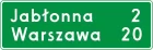 Znak E-13 Znak odległości od miejscowości - drogowy kierunku miejscowości