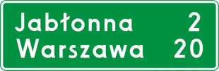 Znak E-13 Znak odległości od miejscowości - drogowy kierunku miejscowości