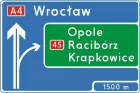 Znak E-1a Tablica przeddrogowskazowa na autostradzie - drogowy kierunku miejscowości