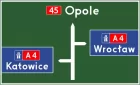 Znak E-1b Tablica przeddrogowskazowa przed wjazdem na autostradę - drogowy kierunku miejscowości