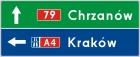 Znak E-2e Drogowskaz tablicowy umieszczany obok jezdni przed wjazdem na autostradę - drogowy kierunku miejscowości