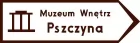 Znak E-9 Drogowskaz do muzeum - drogowy kierunku miejscowości