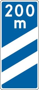 Znak F-14b Znak prowadzący do początku pasa prowadzącego do wyjazdu z autostrady - drogowy uzupełniający