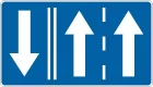 Znak F-15 Wskazanie kierunku jazdy na pasie określonego na znaku - drogowy uzupełniający