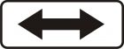 Znak T-26 Tabliczka wskazująca, że zakaz postoju lub zatrzymywania dotyczy strony placu - drogowy